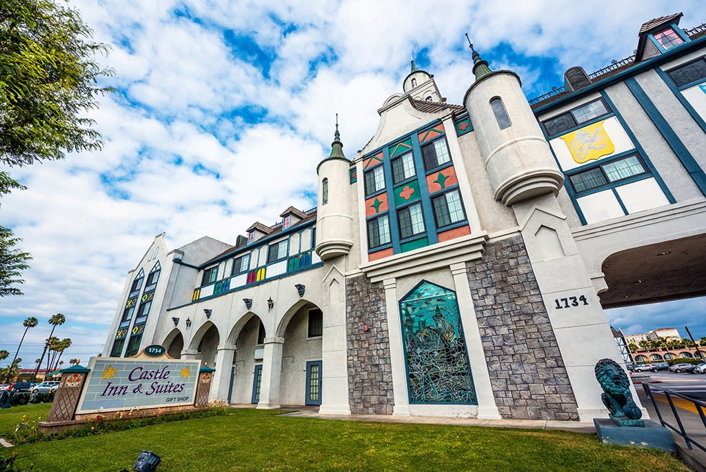 castle-inn-exterior-disneyland-clouds