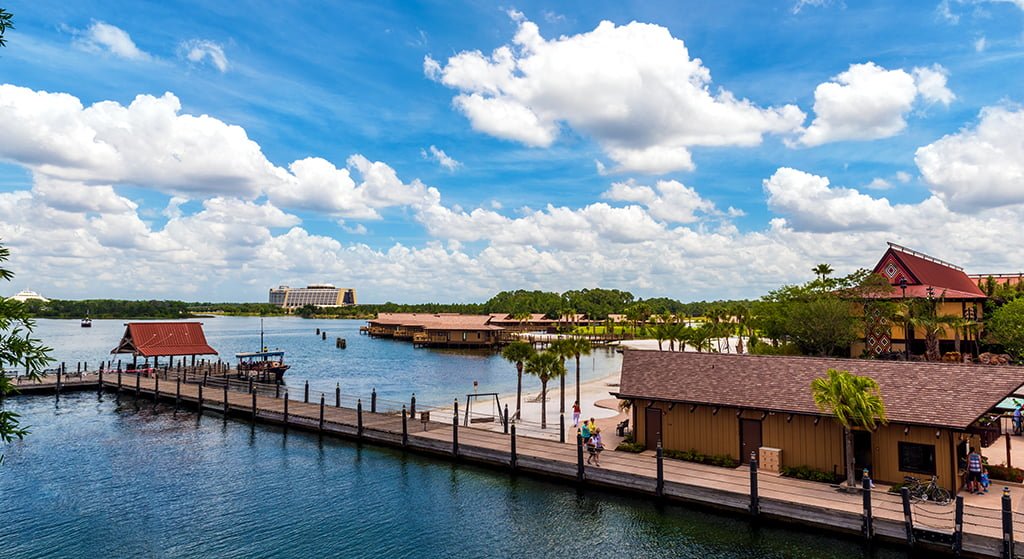 polynesian-bungalows-clouds-blue-sky-aerial